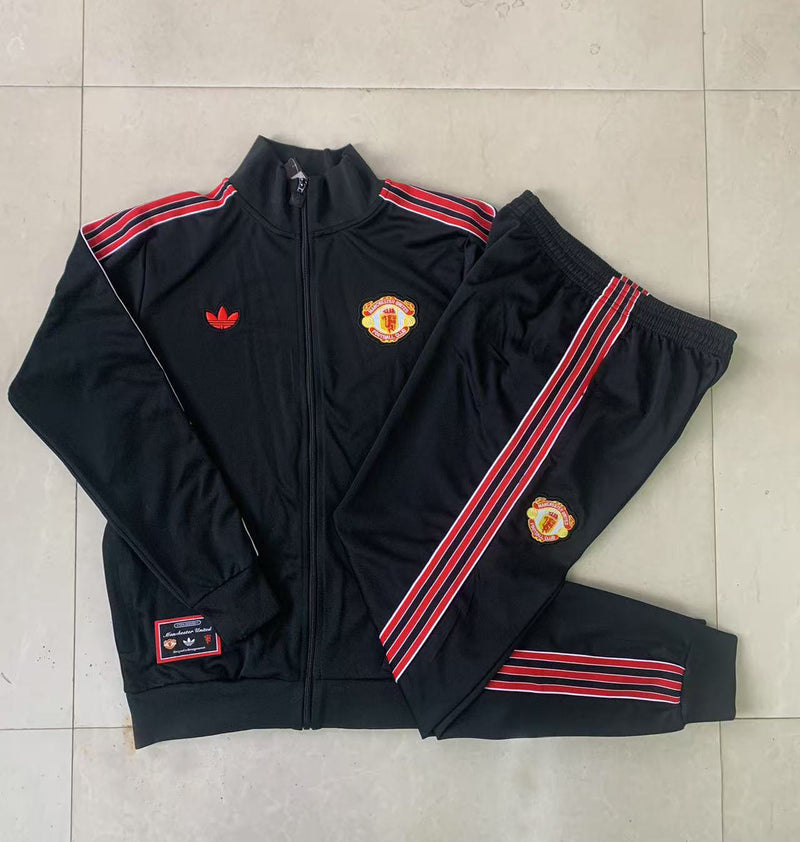 PANTALONES + SUDADERA MANCHESTER UNITED VI 25/26