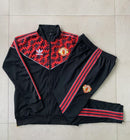 PANTALONES + SUDADERA MANCHESTER UNITED I 25/26